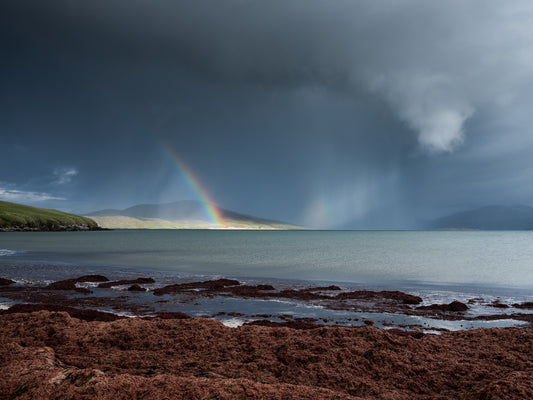 Rainbow and storm clouds over Horgabost, Isle of Harris - Photographic Print